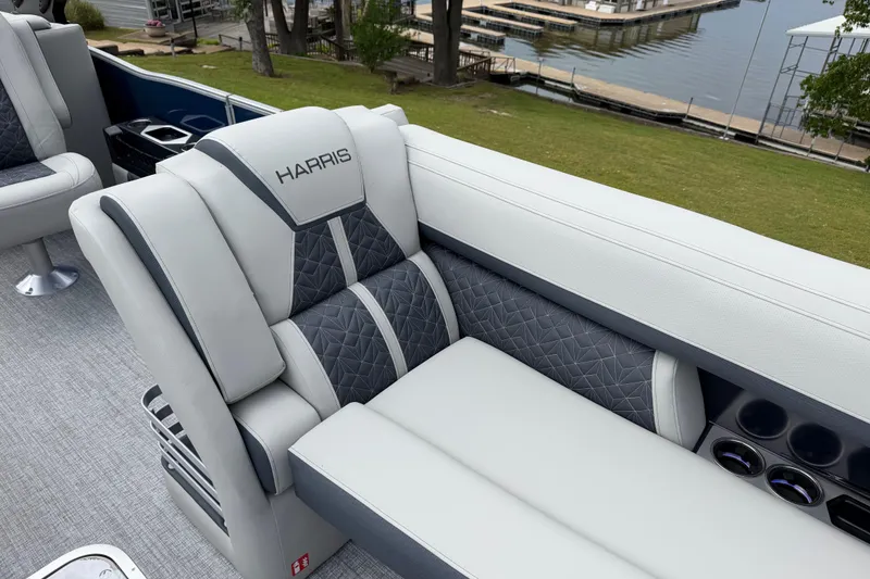 Slide: The Image of Luxurious seating on 2026 Harris Grand Mariner 250 CWDH pontoon boat by the lake. - 8
