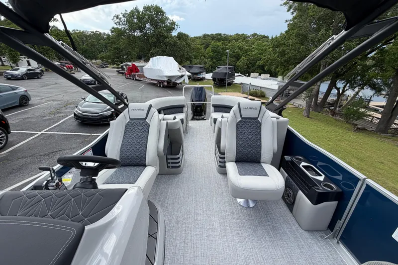 Slide: The Image of 2026 Harris Grand Mariner 250 CWDH pontoon boat with luxurious seating and modern design. - 9