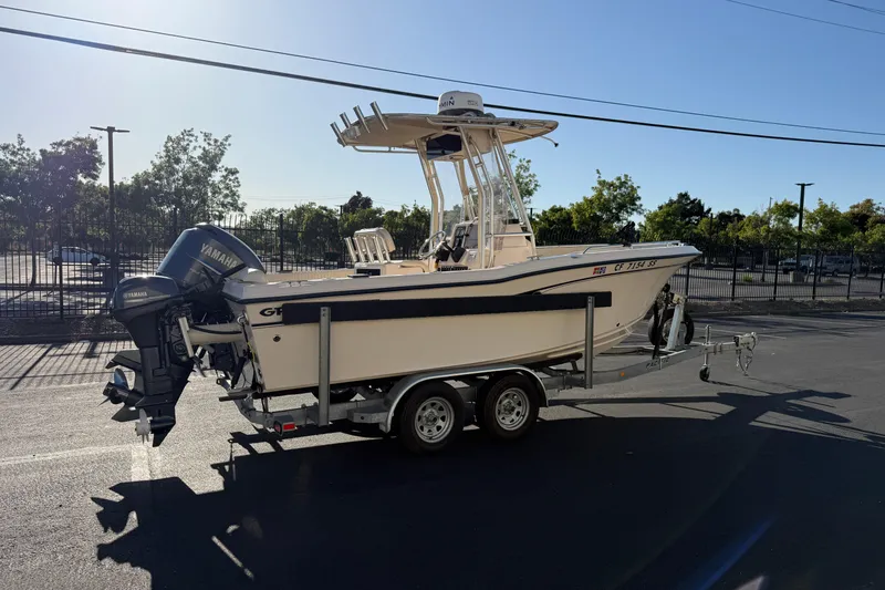 Slide: The Image of 2007 Grady-White Escape 209 boat on trailer with Yamaha outboard motor. - 12