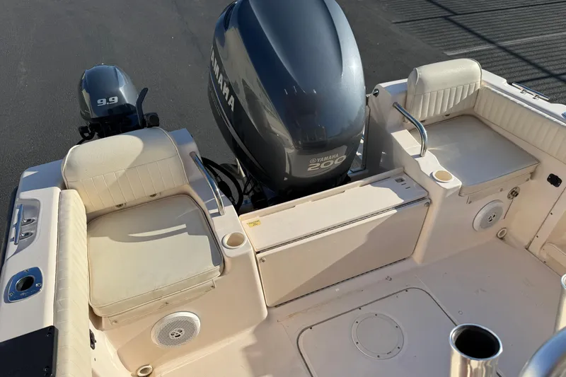 Slide: The Image of 2007 Grady-White Escape 209 boat with Yamaha 200 engine, featuring seating and storage. - 28