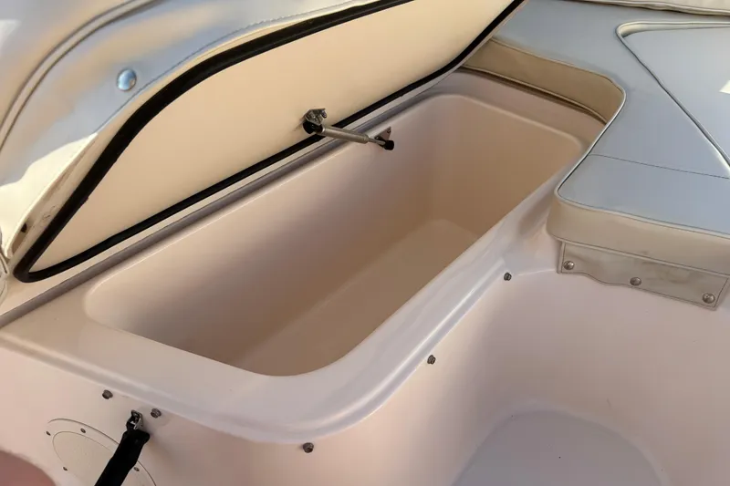 Slide: The Image of Open storage compartment on 2007 Grady-White Escape 209 boat. - 32
