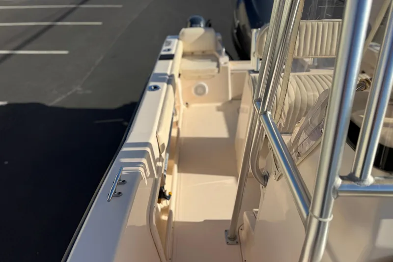 Slide: The Image of 2007 Grady-White Escape 209 boat interior with seating and railing details. - 37