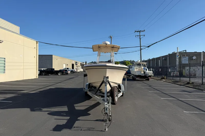 Slide: The Image of 2007 Grady-White Escape 209 boat on trailer in industrial parking lot. - 5