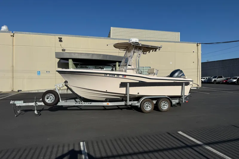 Slide: The Image of 2007 Grady-White Escape 209 boat on trailer in parking lot. - 7