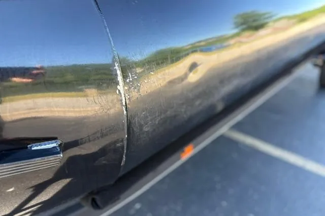 Slide: The Image of Close-up of a 2025 Regency 250 DL3 with visible surface scratches. - 26