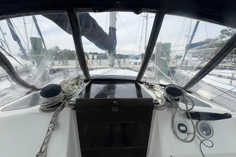 Slide: The Image of Cockpit view of 1989 Hunter Vision 32 sailboat docked at marina. - 19