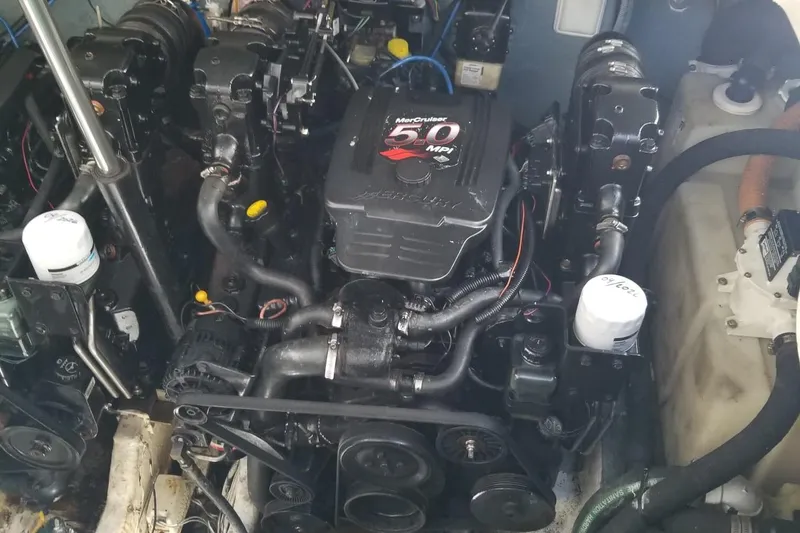 Slide: The Image of Engine compartment of a 2004 Sea Ray 300 Sundancer with MerCruiser 5.0 MPI engine. - 10