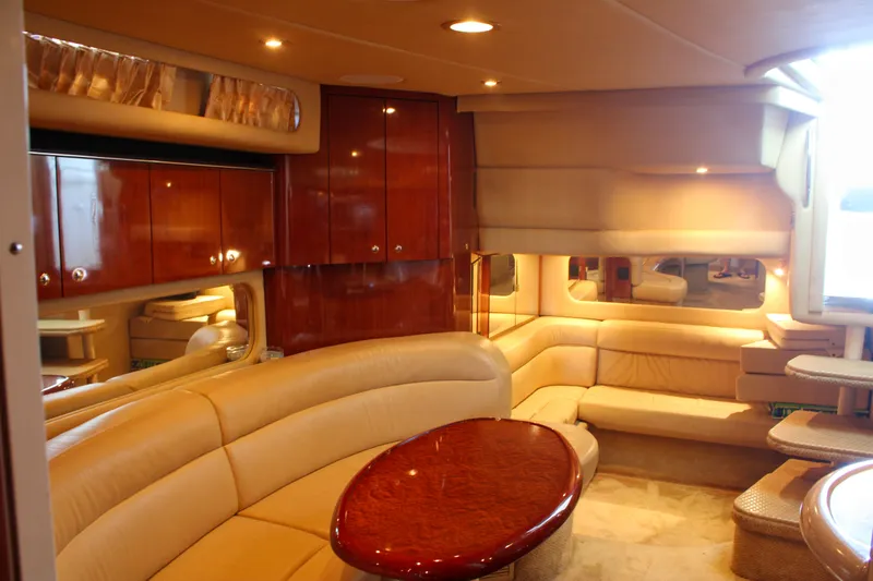 Slide: The Image of Luxurious interior of a 2003 Sea Ray 380 Sundancer yacht with plush seating. - 29