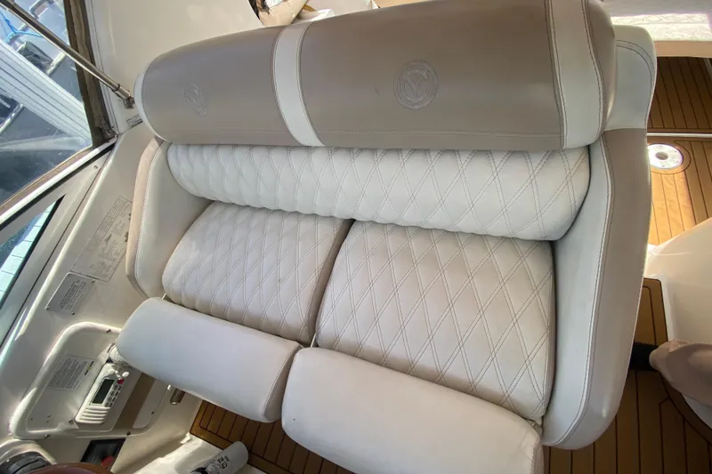 Slide: The Image of Luxurious seating on 2002 Cruisers Yachts 3572 Express with diamond-stitched upholstery. - 21