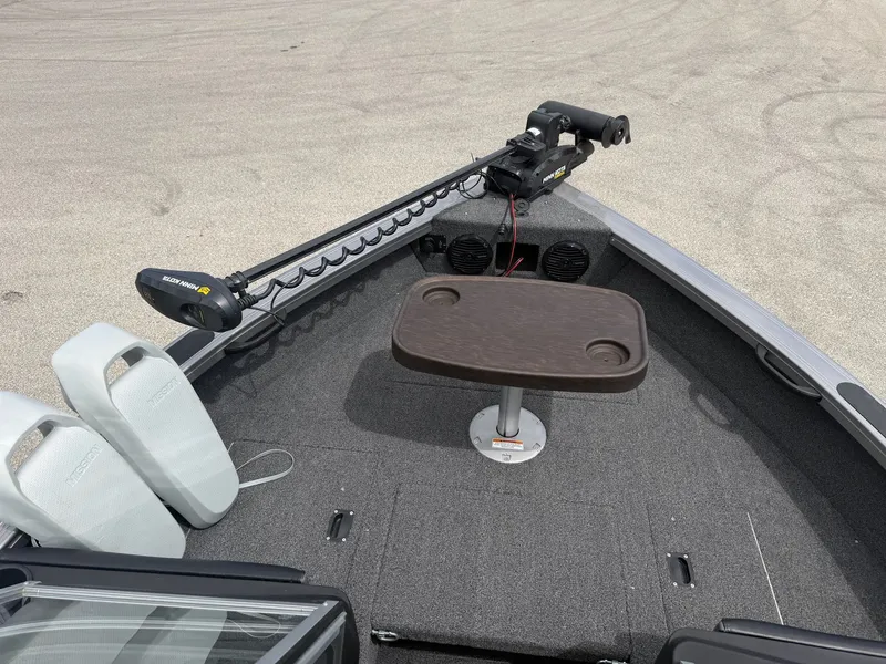 Slide: The Image of 2021 Crestliner 1750 Super Hawk with Minn Kota motor and table. - 17