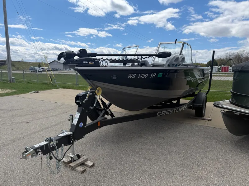 Slide: The Image of 2021 Crestliner 1750 Super Hawk boat on trailer, blue sky. - 3