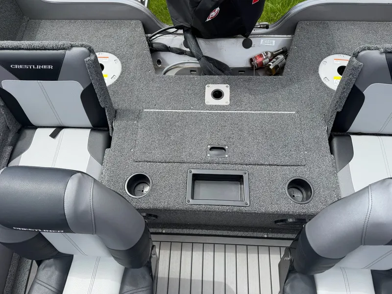 Slide: The Image of Interior of a 2021 Crestliner 1750 Super Hawk boat with seating. - 9