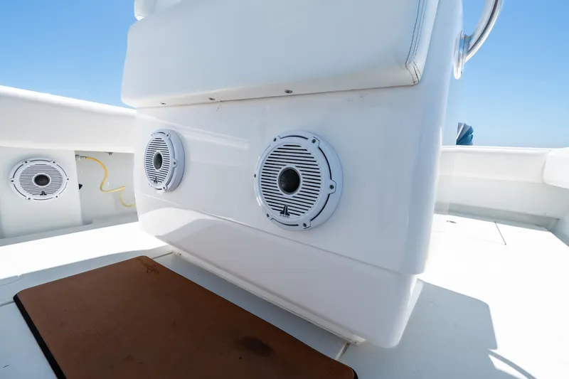 Slide: The Image of 2022 Contender 35 ST boat speakers on deck, showcasing marine audio system. - 23