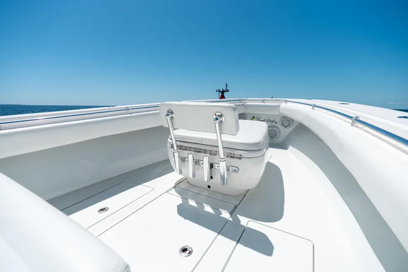 Slide: The Image of 2022 Contender 35 ST boat interior with white seating and ocean view. - 33