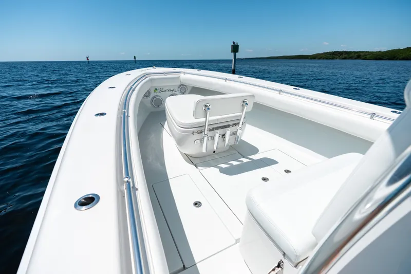 Slide: The Image of 2022 Contender 35 ST boat interior with white seating on open water. - 34