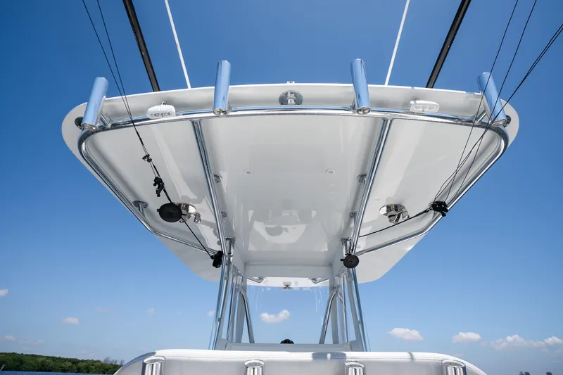 Slide: The Image of 2022 Contender 35 ST boat top view against clear blue sky. - 42