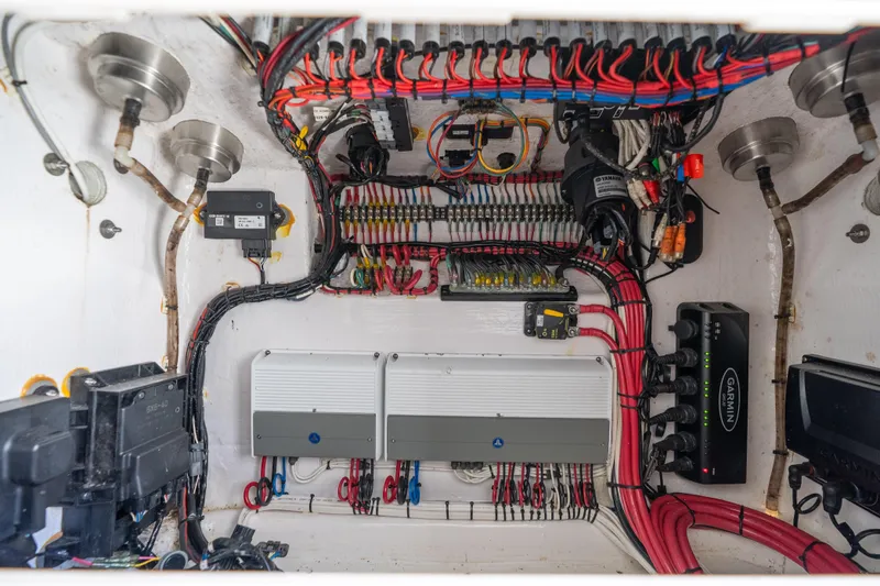 Slide: The Image of Electrical wiring and components inside a 2022 Contender 35 ST boat. - 50