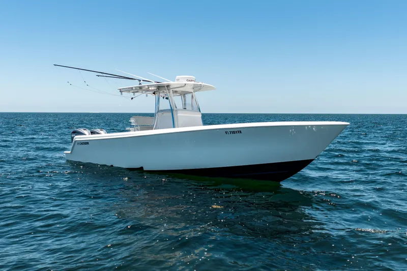 Slide: The Image of 2022 Contender 35 ST boat on open ocean under clear blue sky. - 9