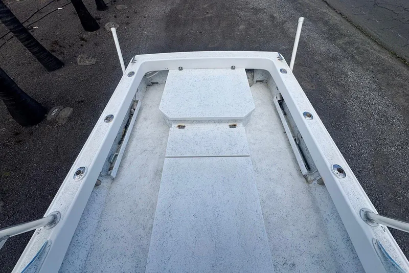 Slide: The Image of 2008 Force Marine Force 21 boat interior with white deck and seating. - 8