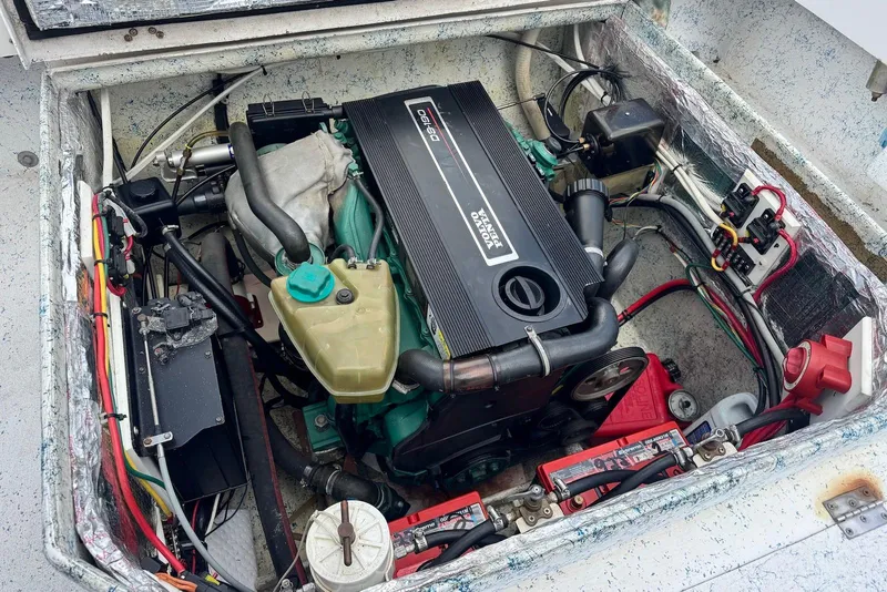 Slide: The Image of Engine compartment of a 2008 Force Marine Force 21 boat, featuring a Volvo Penta engine. - 9