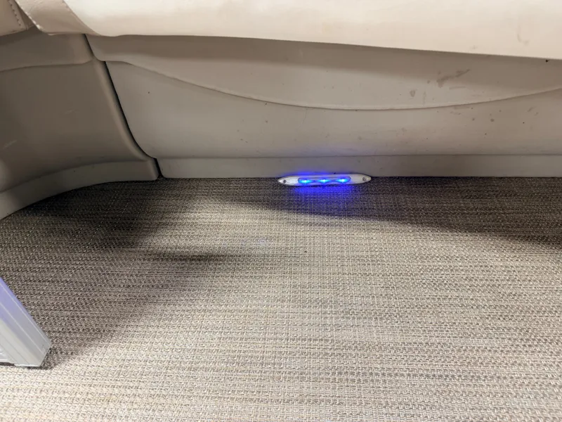 Slide: The Image of Interior of 2016 Sylvan Mirage 8524 LE with blue LED lighting. - 13