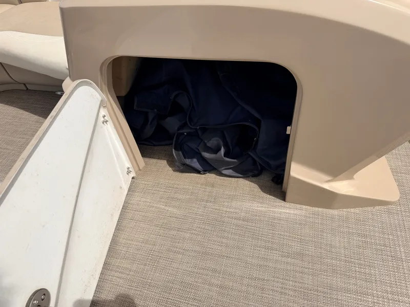 Slide: The Image of Storage compartment in Sylvan Mirage 8524 LE boat, 2016 model. - 21