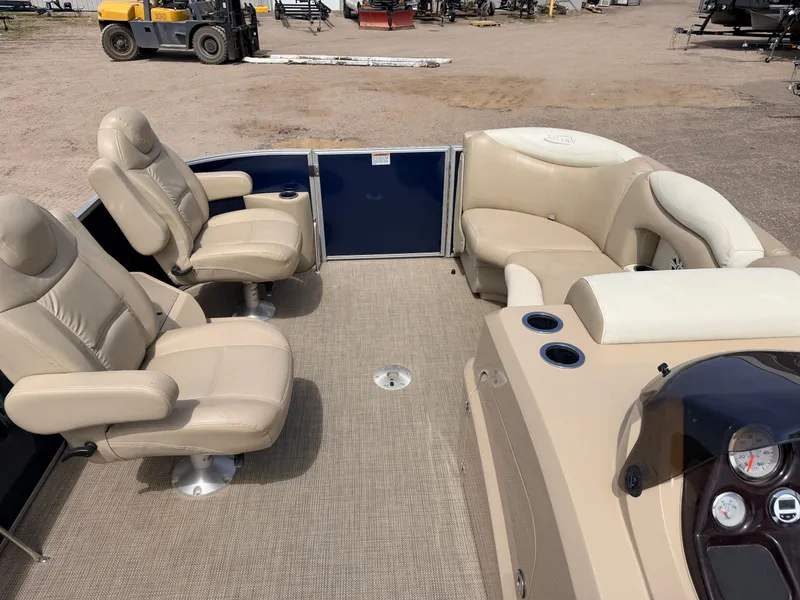 Slide: The Image of Interior of a Sylvan Mirage 8524 LE pontoon boat, beige leather seats, 2016 model. - 3