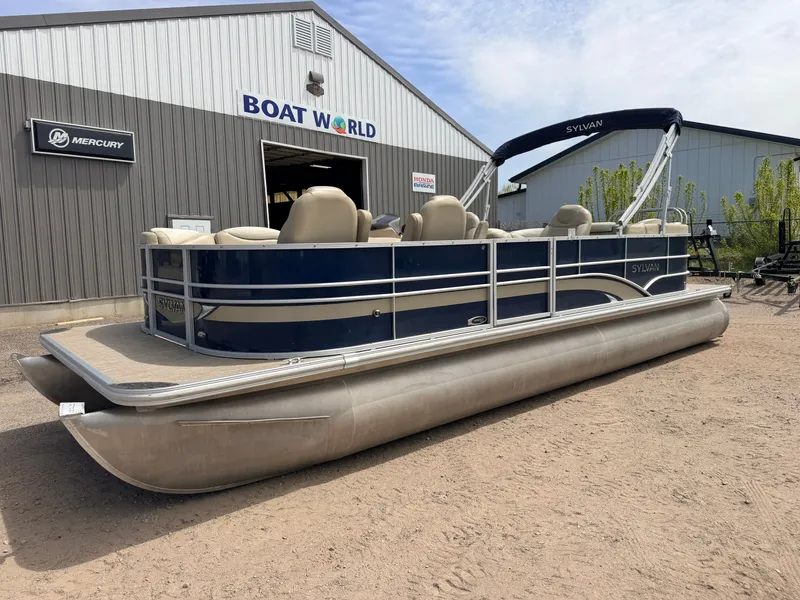Slide: The Image of 2016 Sylvan Mirage 8524 LE pontoon boat outside Boat World building. - 48