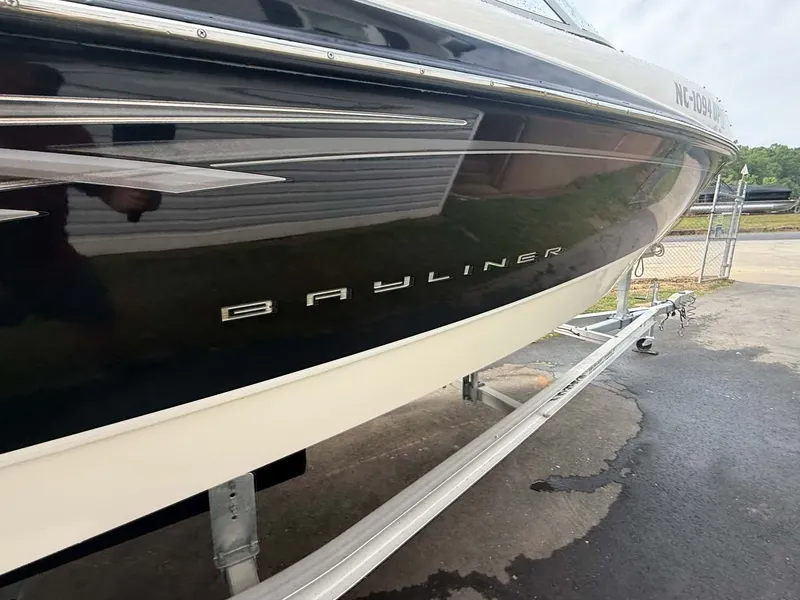 Slide: The Image of 2009 Bayliner 225 BR boat on trailer, side view. - 14
