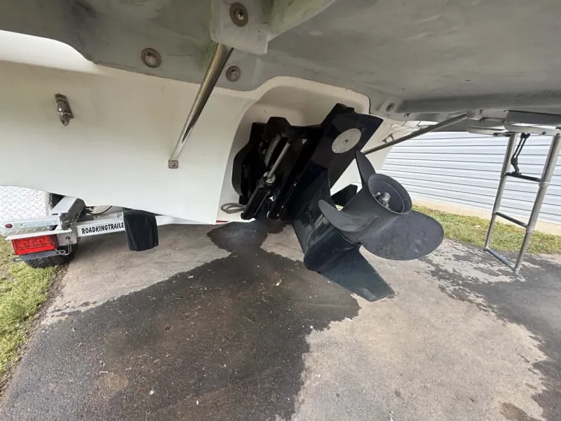 Slide: The Image of Rear view of a 2009 Bayliner 225 BR boat propeller. - 15