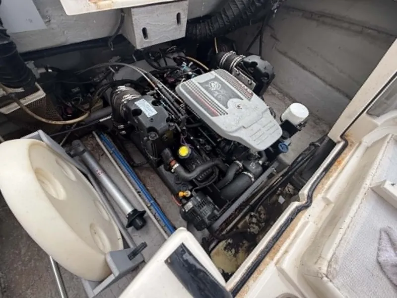 Slide: The Image of Engine compartment of a 2009 Bayliner 225 BR boat. - 4