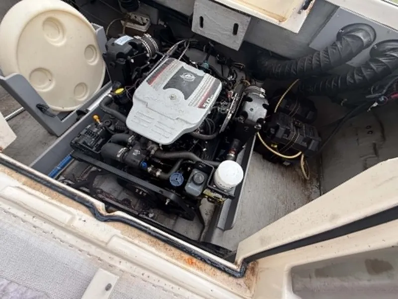 Slide: The Image of Engine compartment of a 2009 Bayliner 225 BR boat. - 6