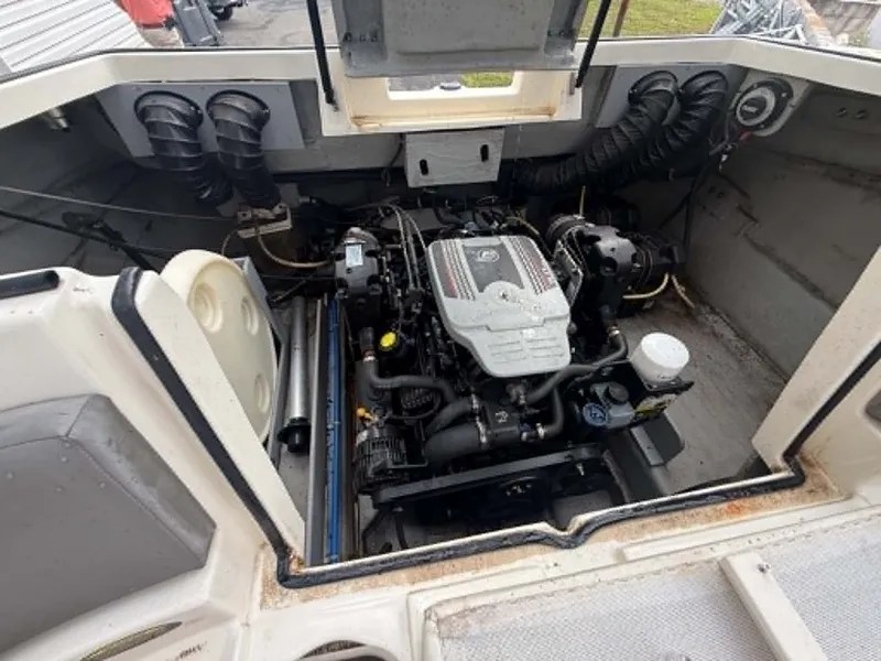 Slide: The Image of Engine compartment of a 2009 Bayliner 225 BR boat. - 8