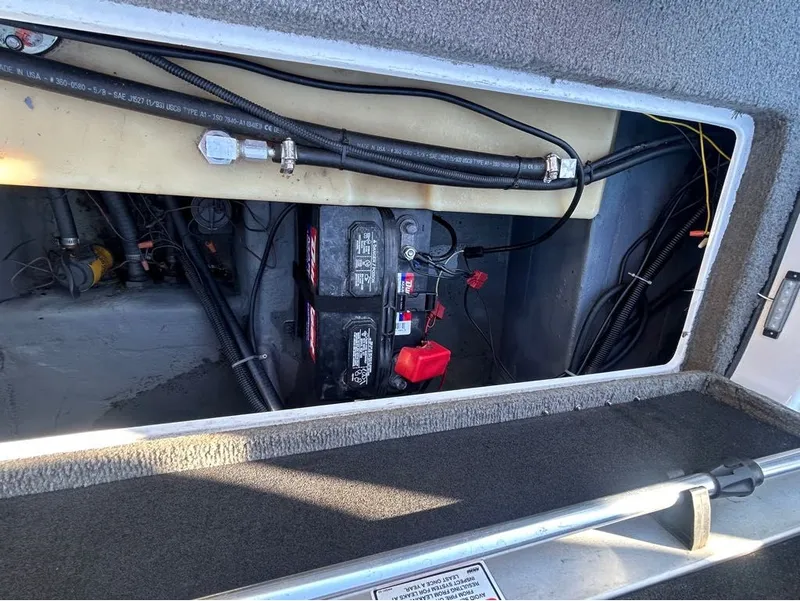 Slide: The Image of Battery compartment of a 2005 Nitro X750 DC boat. - 13