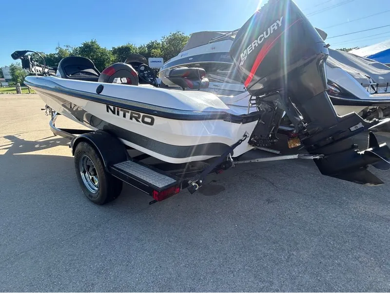 Slide: The Image of 2005 Nitro X750 DC boat with Mercury outboard motor. - 3