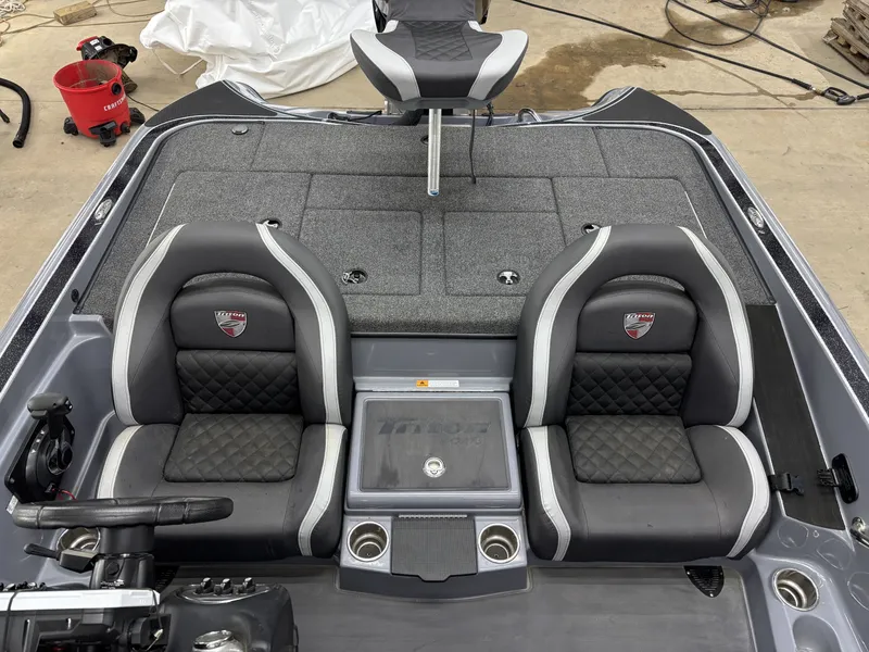 Slide: The Image of 2022 Triton 18 TrX boat interior with dual seats. - 17