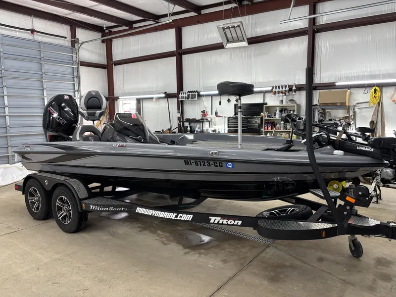 Slide: The Image of 2022 Triton 18 TrX boat in a workshop. - 4