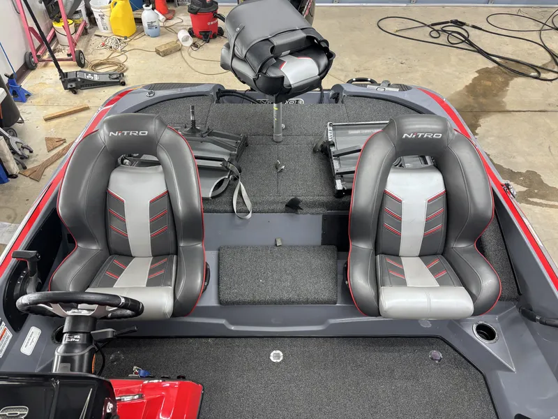 Slide: The Image of Interior of 2023 Nitro Z18 Pro with gray and red seats. - 17