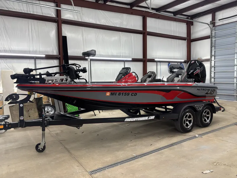 Slide: The Image of 2023 Nitro Z18 Pro boat in a storage facility. - 3