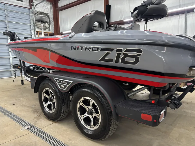 Slide: The Image of 2023 Nitro Z18 Pro boat parked in a garage. - 4