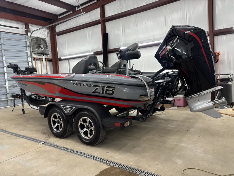 Slide: The Image of 2023 Nitro Z18 Pro boat parked in a garage. - 5