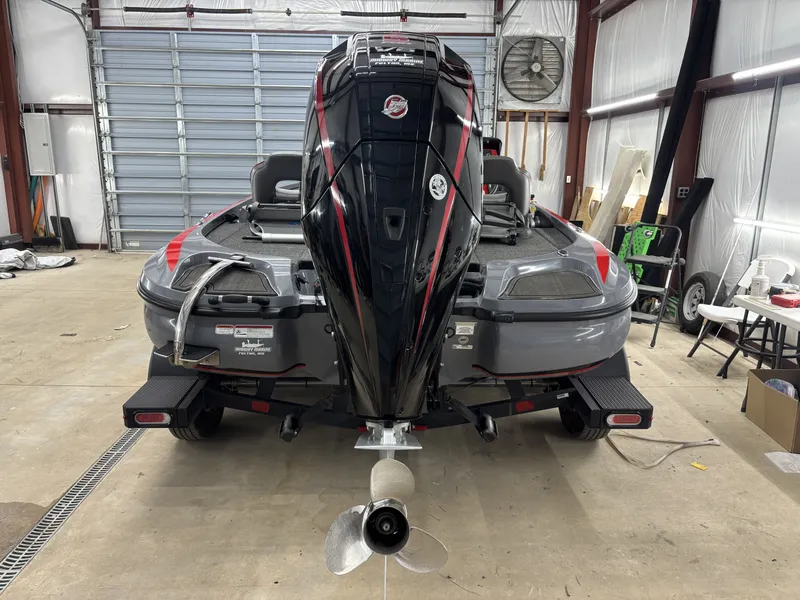 Slide: The Image of 2023 Nitro Z18 Pro boat in a workshop. - 8