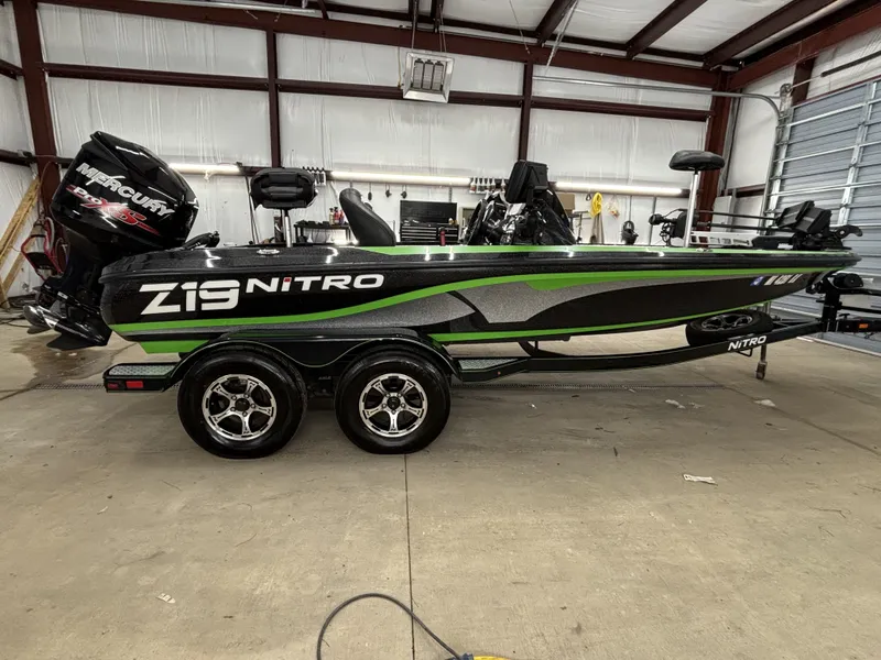 The Image of 2017 Nitro Z19 Pro boat in warehouse, side view. - 1