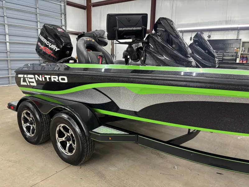 Slide: The Image of 2017 Nitro Z19 Pro boat with Mercury engine in garage. - 11