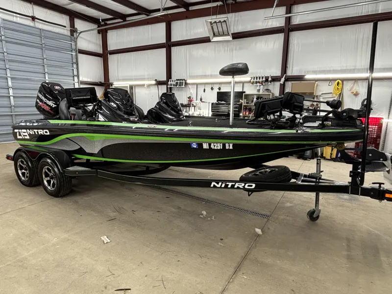 Slide: The Image of 2017 Nitro Z19 Pro boat in a warehouse. - 5