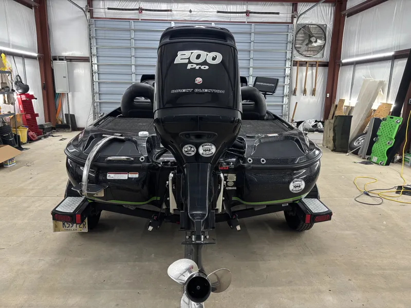 Slide: The Image of 2017 Nitro Z19 Pro boat with 200 HP motor in garage. - 6