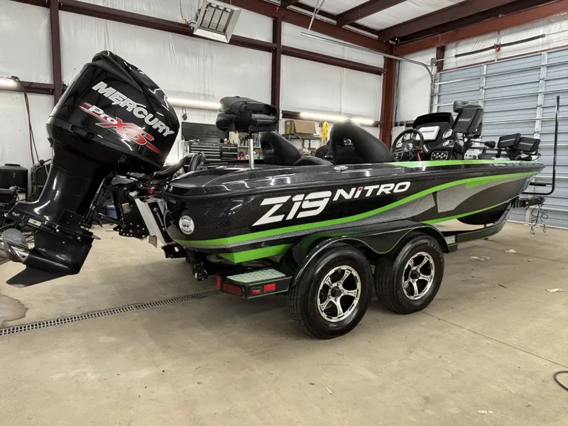 Slide: The Image of 2017 Nitro Z19 Pro boat with Mercury engine in garage. - 7