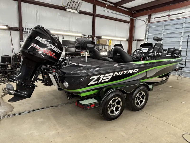 Slide: The Image of 2017 Nitro Z19 Pro boat in a workshop. - 9