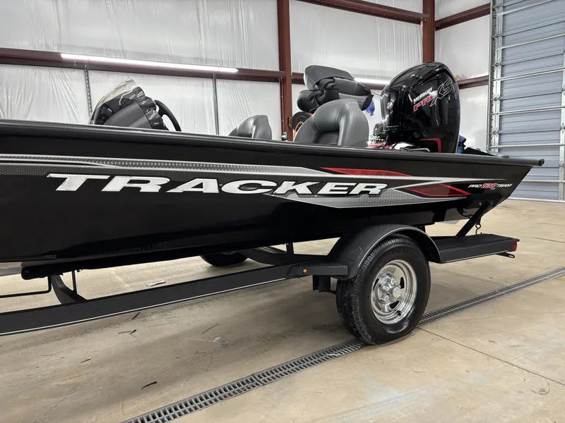 Slide: The Image of 2023 Tracker 190TX TE boat in warehouse. - 11
