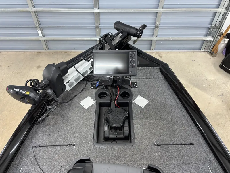 Slide: The Image of 2023 Tracker 190TX TE boat with electronics and controls. - 13